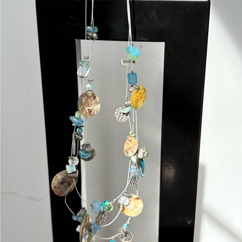 Kole wire necklace/blues, yellows/silver tone/measures 16-18 in total le…